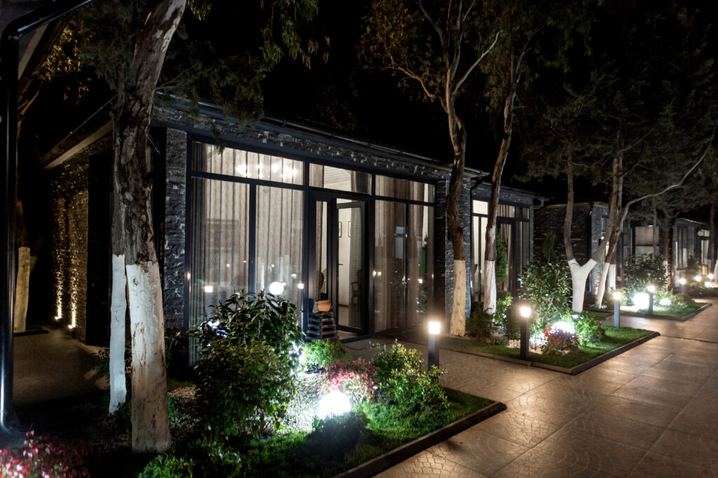 outside view restaurant cottage night time scaled